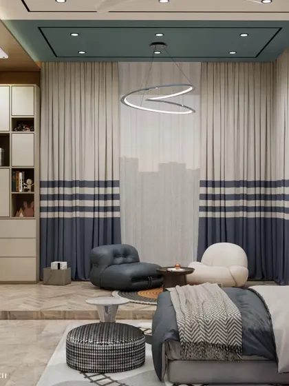 This view showcases the cozy reading and play corner, complete with comfortable, modern floor chairs and custom two-toned curtains. The raised platform helps to define the play zone from the rest of the room.