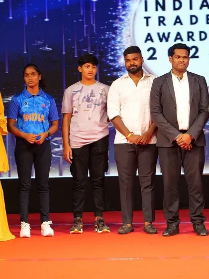 Posing for a photo on the awards stage. We are proud of every member of our team.