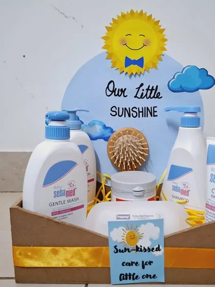 I believe in using products I trust, which is why I often include brands like Sebamed in my skincare hampers. This 'Our Little Sunshine' themed gift includes a full set of gentle wash, shampoo, and cream, perfect for a newborn's sensitive skin.