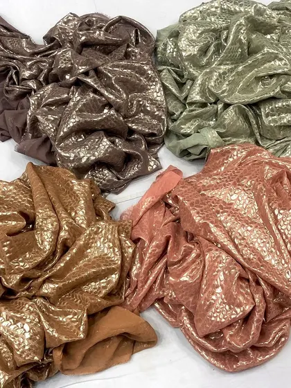 A collection of four different colors of my shimmer foil georgette. The wide width of this fabric makes it an economical and practical choice for designers creating voluminous outfits.