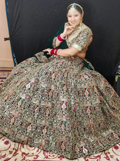 A grand, flared lehenga paired with a custom bridal jewellery set. This shows how I can help you style your entire look, from the outfit to the accessories.