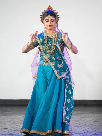 As Radha, every gesture is filled with devotion. Here, the hand mudras and expression convey a specific emotion from the narrative of her divine love story with Krishna.