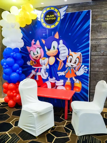 A 'Glam Tattoo' station with a Sonic the Hedgehog theme, providing a fun and creative activity for guests.