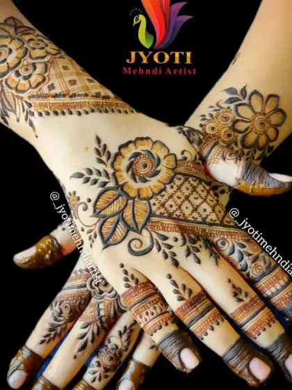 A classic floral design for the back of the hands. The composition is elegant and symmetrical, making it a popular choice for guests and bridesmaids.