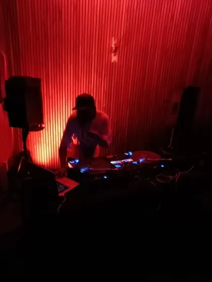 Me at the controls during a fun night of 90's hip hop. It's nights like these that remind me why I fell in love with DJing in the first place.
