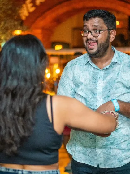 A fun and energetic moment on the dance floor.