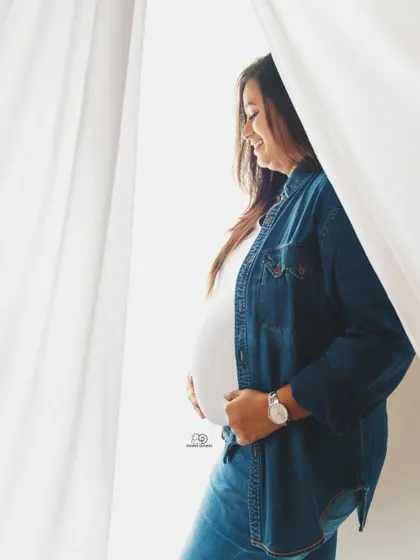 A candid smile captured in a light and airy at-home setting. These lifestyle sessions are all about capturing your genuine happiness in a comfortable environment.