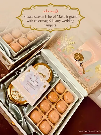 "Shaadi season is here!" This image showcases our luxury wedding hampers, complete with a personalized thank you note. We work with you to create gifts that make your big day grand.