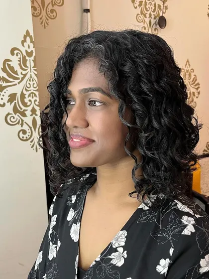 The final look: a stylish curly inverted bob and 12 inches of hair donated.