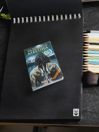 A miniature drawing of the book cover for 'The Immortals of Meluha' by Amish Tripathi. I used color pencils on black paper to recreate the cover art in tiny, precise detail.