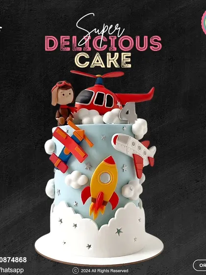 Soar to new heights with this aviation-themed cake. It's perfect for a little pilot's birthday, featuring a helicopter, rocket, and airplanes flying through fluffy fondant clouds.