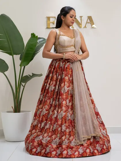 Bloom in elegance with this tulip flower georgette printed lehenga. I paired the floral skirt with a stunning thunder grey raw silk blouse, fully embroidered with gold zardozi for a perfect festive look.