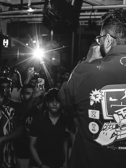From behind, you can see the crowd's reaction. Their energy is what makes a show unforgettable.