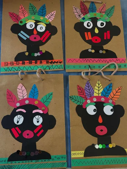 More examples of the wonderful tribal art collages. I love the different expressions and patterns the kids came up with.