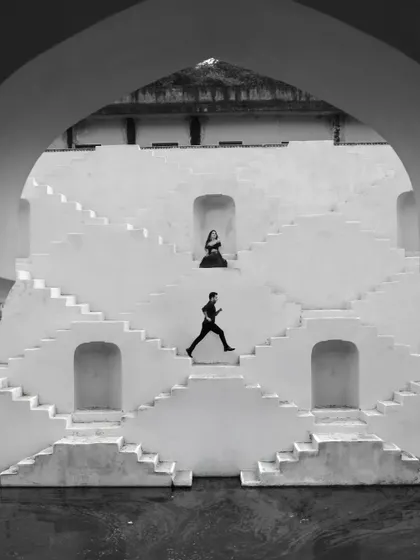 A pre-wedding shoot is a chance to tell a story before the story begins. Using the incredible architecture of Jaipur's stepwells, I create frames that are both art and narrative, capturing the couple's dynamic in a setting that is as unique as their love.