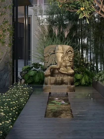 I designed this tranquil courtyard to be a spiritual sanctuary within a residential complex. A central Ganapati sculpture is set against a backdrop of bamboo and a serene water feature, creating a contemplative space that fosters a deep connection to both nature and spirituality.