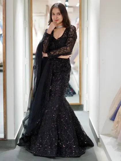 Stitched with sass and a hint of main character energy. This black sequined mermaid lehenga is designed to make you feel unstoppable.