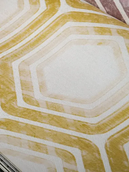 A retro-inspired geometric pattern in a cheerful yellow. This design is perfect for adding a touch of vintage flair and a pop of color to any room.