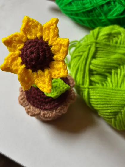 Say it with sunshine! This handmade crochet sunflower pot is the perfect everlasting gift for someone special.