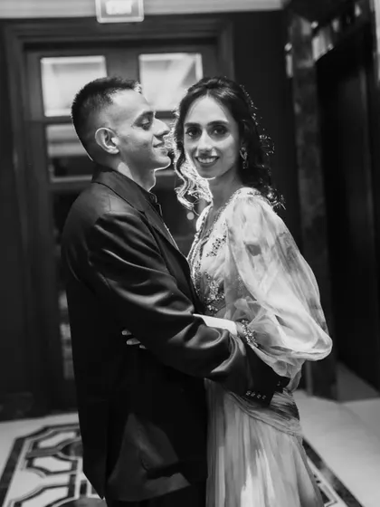 A classic, romantic embrace. This black and white portrait has a timeless feel, perfect for capturing the essence of an engagement.
