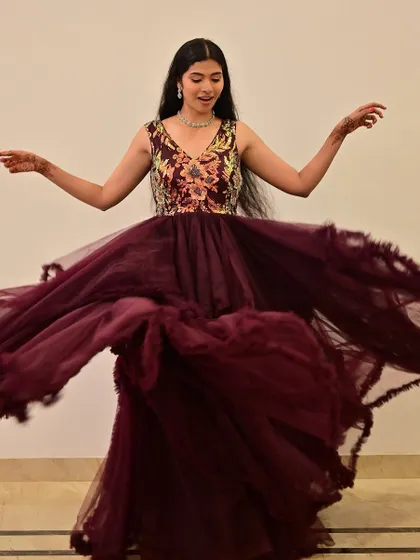 A joyful, twirling motion that shows the beautiful volume of the gown. The makeup stays perfectly in place, looking fresh and elegant.