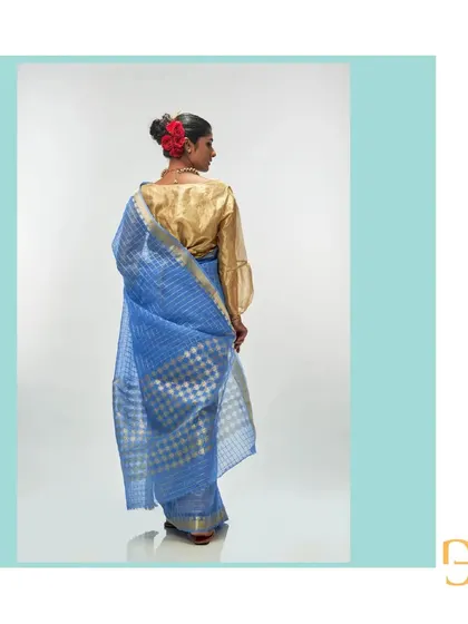 Another look at the back of the cornflower blue saree, capturing the beautiful fall of the handwoven organza.