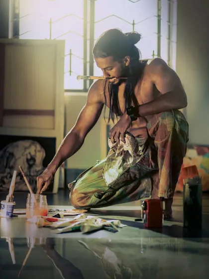 Art is a way of recognizing oneself. A shot of me in my element, surrounded by canvases and paints in my studio.