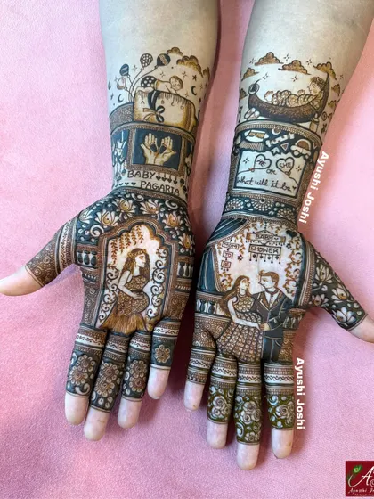 A full view of a custom baby shower mehendi, featuring portraits of the mom and dad to be, and adorable details like a baby in a viking ship.