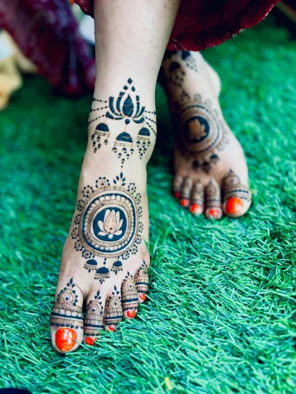 An angled view of the bold lotus mandala feet design, showing its striking appearance.