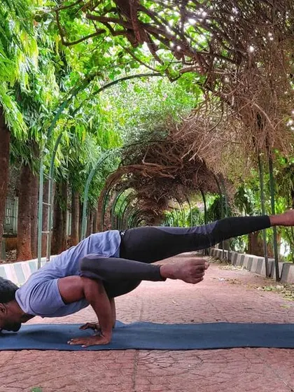 Playing with an arm balance, Eka Pada Koundinyasana II, on the pathway. Using the stability of the ground to fly.