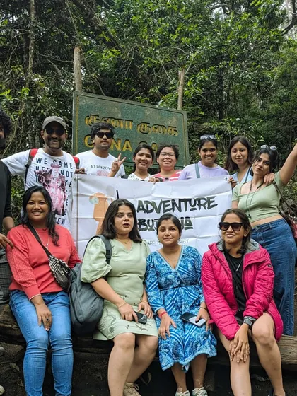 The group posing at the entrance to Guna Caves in Kodaikanal, ready to explore the mysterious and beautiful spot.