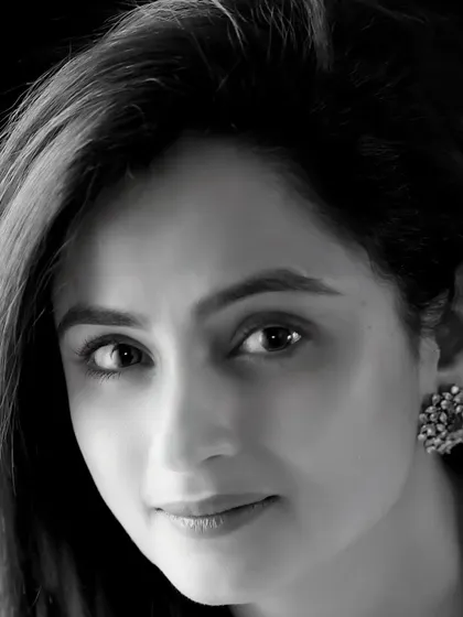 A timeless black and white close-up of actress Madirakshi Mundle. The soft lighting and gentle expression create a portrait that is both elegant and soulful.