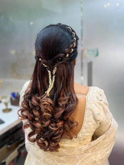A variation of the half-up style, this time using a delicate golden hair vine. I teach students how to work with different types of accessories to match the client's outfit and event theme.