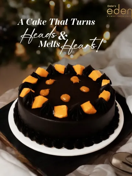 A cake that turns heads and melts hearts. This rich, dark chocolate cake is topped with fresh, juicy mango chunks, creating a surprising and delicious tropical twist on a classic.
