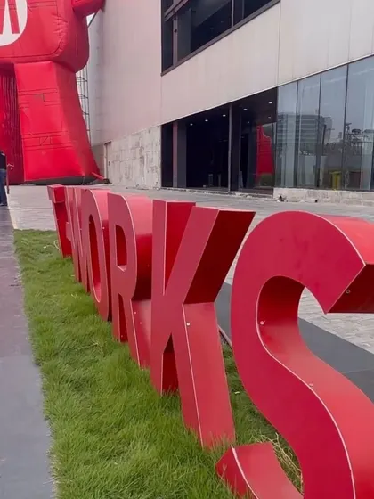 Buildings are often just backdrops for life, and our T Works project is a perfect example. Here, the focus is on the vibrant community event, with our simple, functional building providing the stage for the Maker Faire.
