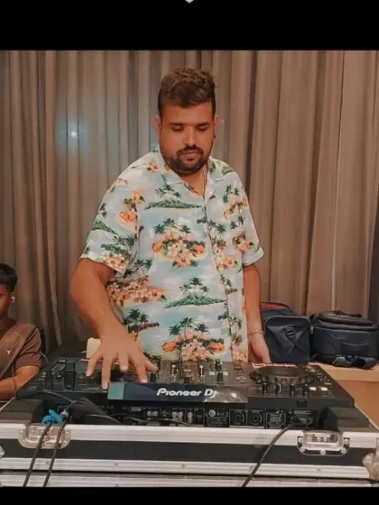 Another angle of me at the decks, ensuring the music for the evening is perfect.