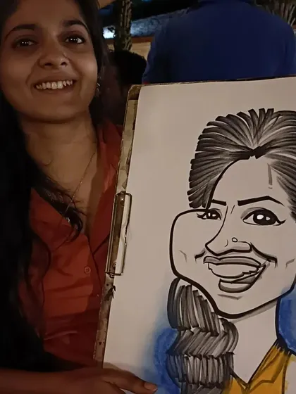 A happy diner with her portrait from a night at Mountain High.