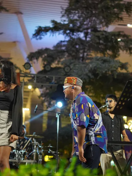 A candid moment on stage with the band. We have so much fun together, and I think that joy translates to the audience.