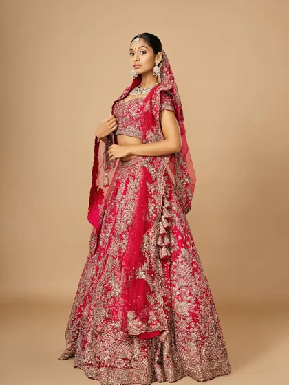 The full bridal look, showing how the makeup stands out beautifully, completing the entire regal ensemble from head to toe.