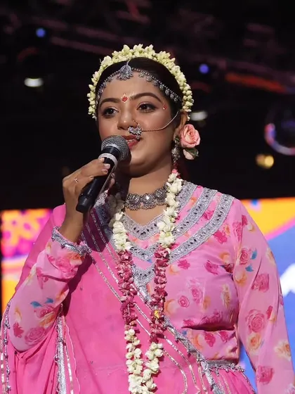 Embodying the grace of Radha on stage. My theatrical background allows me to bring characters and themes to life, adding a unique narrative layer to the events I host.