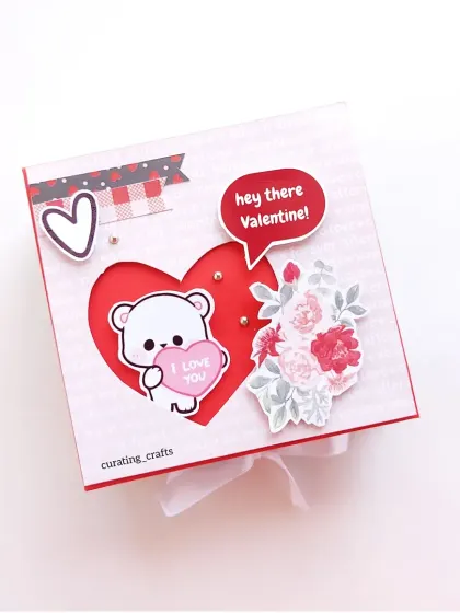 A sweet Valentine's Day scrapbook cover with a cute bear and floral details, perfect for your special someone.
