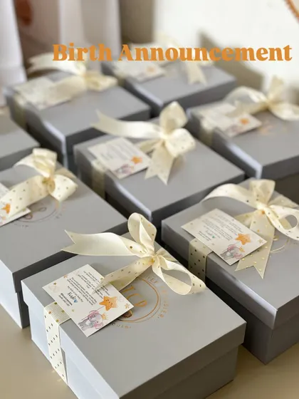 Announcing a birth is a precious moment. We create these elegant grey boxes with custom cards and ribbons to make your announcement seamless and beautiful.