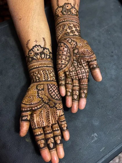 A bold design with strong lines and filled sections, perfect for someone who wants their mehendi to stand out.