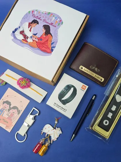 A Rakhi hamper for your brother that has it all. It includes a personalized wallet, a Mi smart band, a chocolate bar, and other fun goodies, all presented in a custom illustrated box.