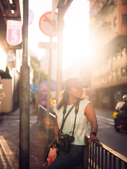 A candid laugh captured in the perfect light. The preset adds a layer of warmth and cinematic quality to this personal moment.
