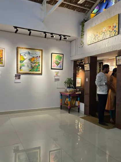Visitors exploring the "Timeless Whispers" exhibition. Our gallery is designed to offer an intimate and personal viewing experience.