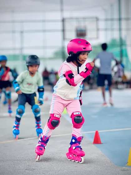 This young champion is in her element, skating with power and grace. Our kids' skating lessons are designed to help each child find their own rhythm and confidence on wheels.