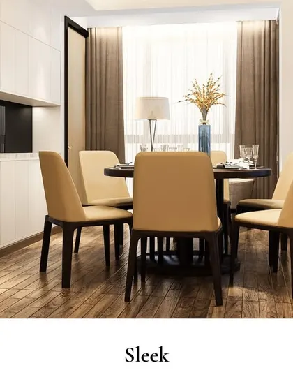 With its clean lines and understated elegance, this dining room embraces modern sophistication. Warm wooden flooring contrasts beautifully with the taupe chairs and polished decor.