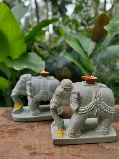 These ornate stone elephants, with diyas placed on their backs, are powerful symbols used to remove obstacles and welcome blessings.