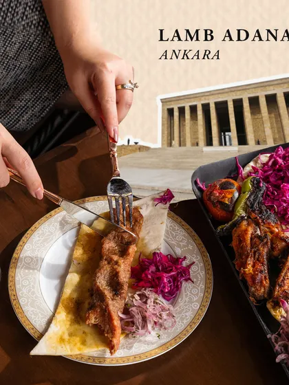A taste of Ankara in Delhi. Our Lamb Adana is a savory, perfectly spiced kebab that captures the essence of Turkish grilling, served with traditional accompaniments.